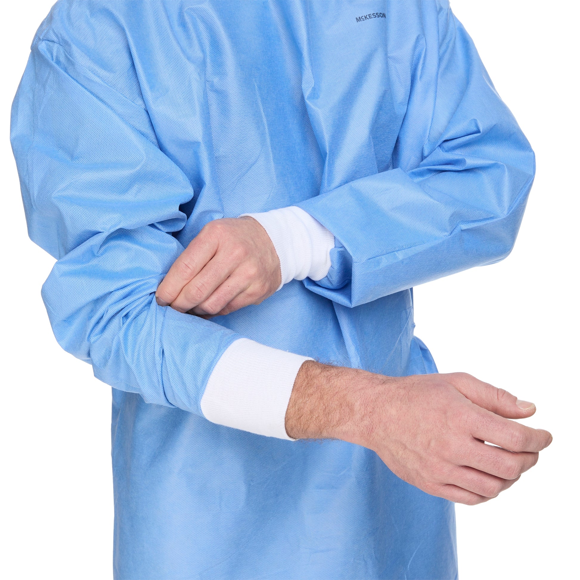 model wearing a blue gown with white stretchable cuffs