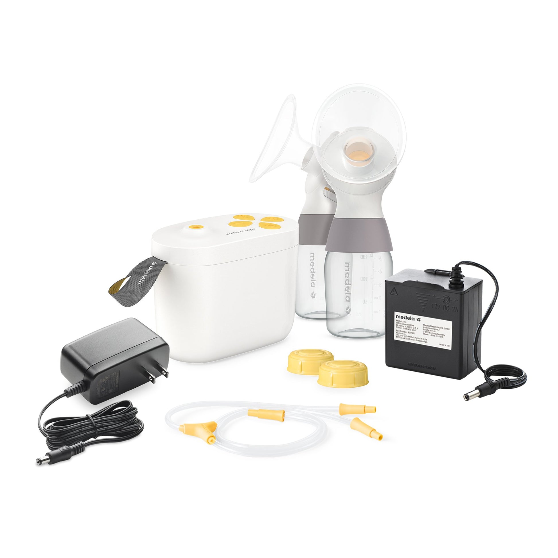 Breast pump with bottles, flanges, charger, tubing.