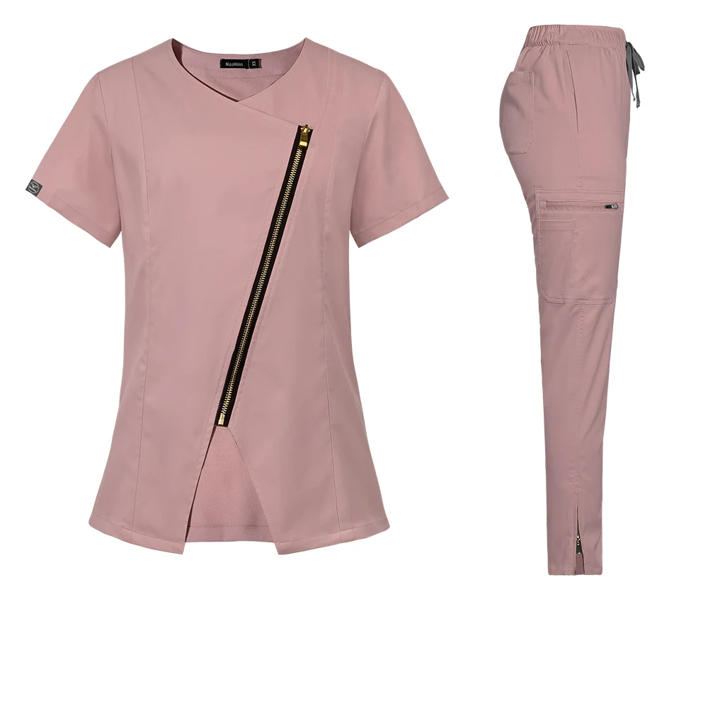 pink stylish scrub set. Scrub top with zipper going across the chest. Scrub pant with zippers on ankle cuffs, elastic waistband, adjustable drawstrings