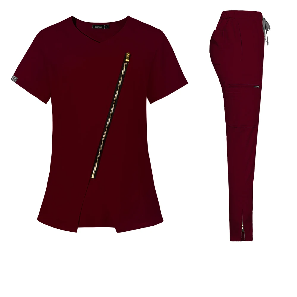 burgundy stylish scrub set. Scrub top with zipper going across the chest. Scrub pant with zippers on ankle cuffs, elastic waistband, adjustable drawstrings