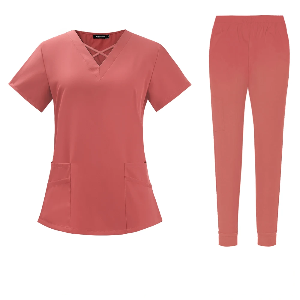 criss cross neck design scrub top with jogger style scrub pants scrub set coral