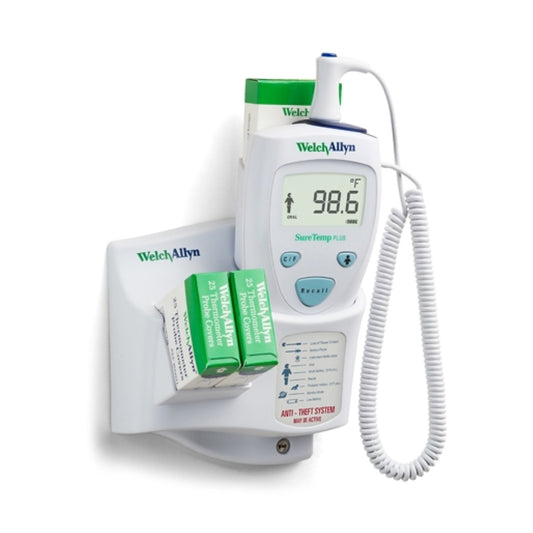 Welch Allyn Thermometer mounted on wall with disposable thermometer covers. Extendable cord.