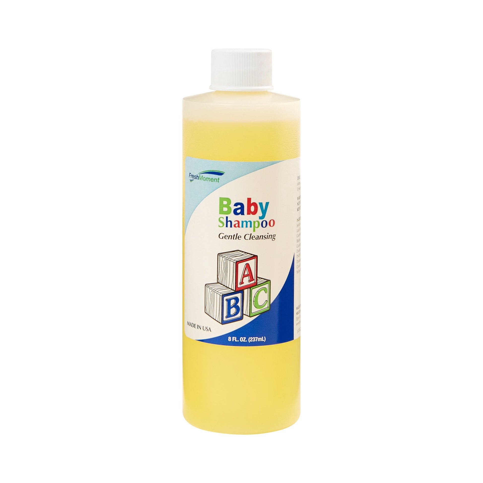 a bottle of baby shampoo gentle cleansing. light yellow liquid