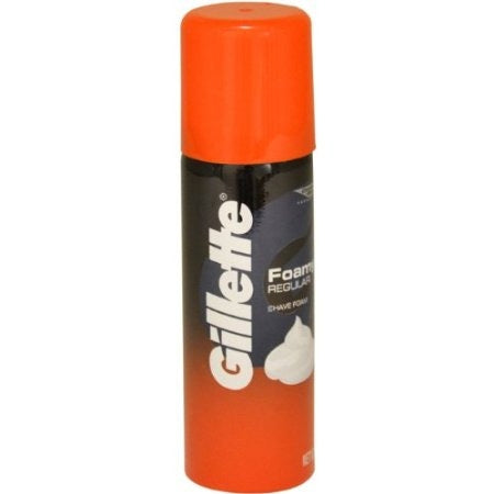 A bottle of Gillette Foam Regular Shave Foam. Orange cap.