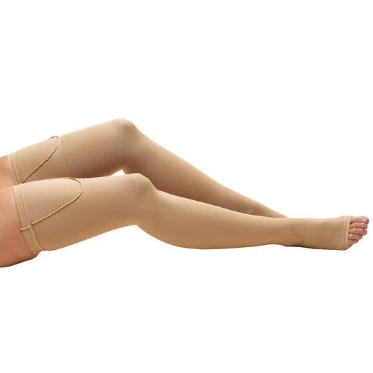 Model wearing thigh high compression stockings. Open toe. Beige color.