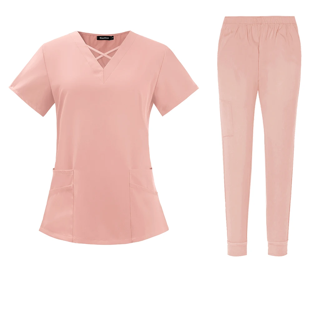 criss cross neck design scrub top with jogger style scrub pants scrub set pink