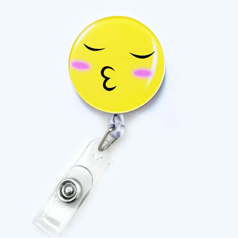 badge reel kissy face emoji. Retractable