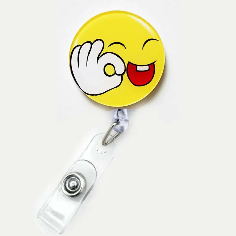 badge reel smiley face with "OK" sign emoji. Retractable