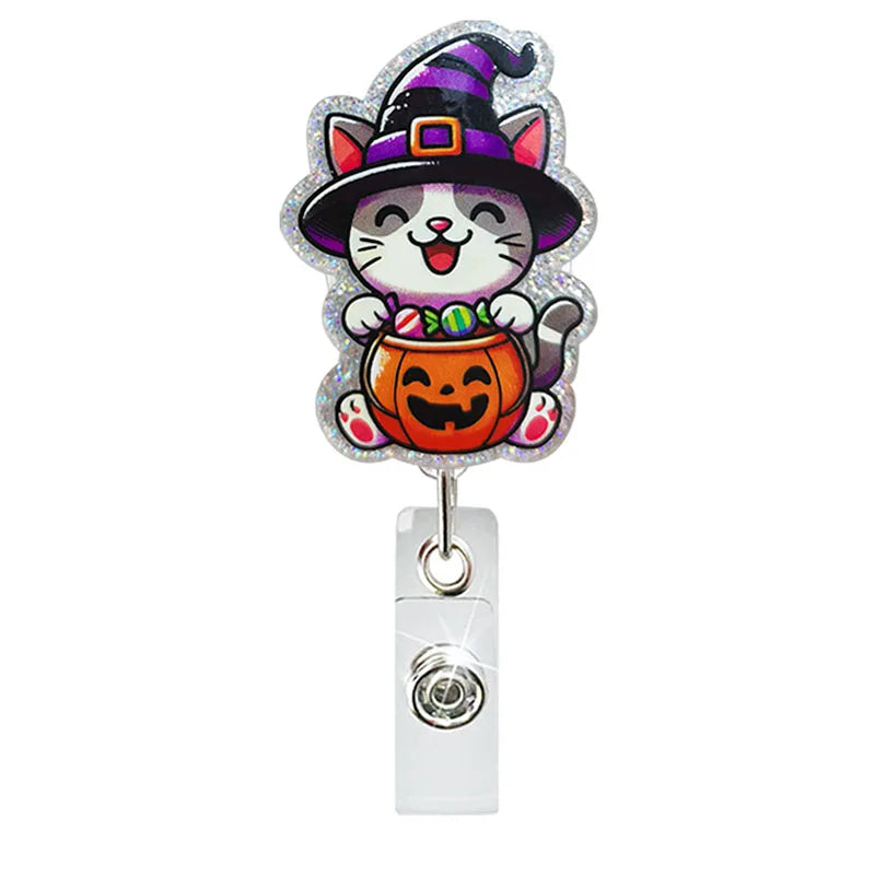 badge reel cat with halloween container with candies. Retractable  with alligator clip.