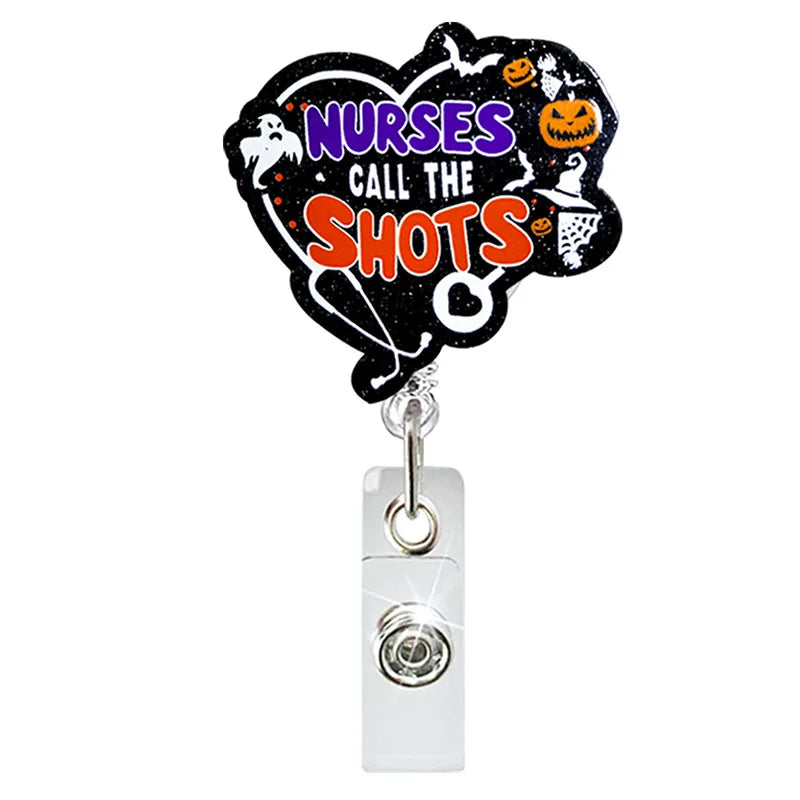 badge reel "nurses call the shots". Retractable  with alligator clip.