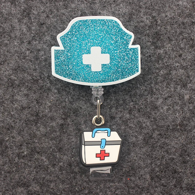 badge reel nurse's hat with a healthcare suitcase under ID holder clasp.