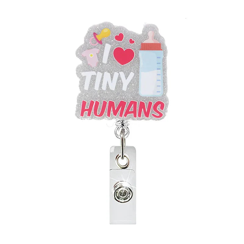 badge reel "I LOVE TINY HUMANS". Retractable, alligator clip.