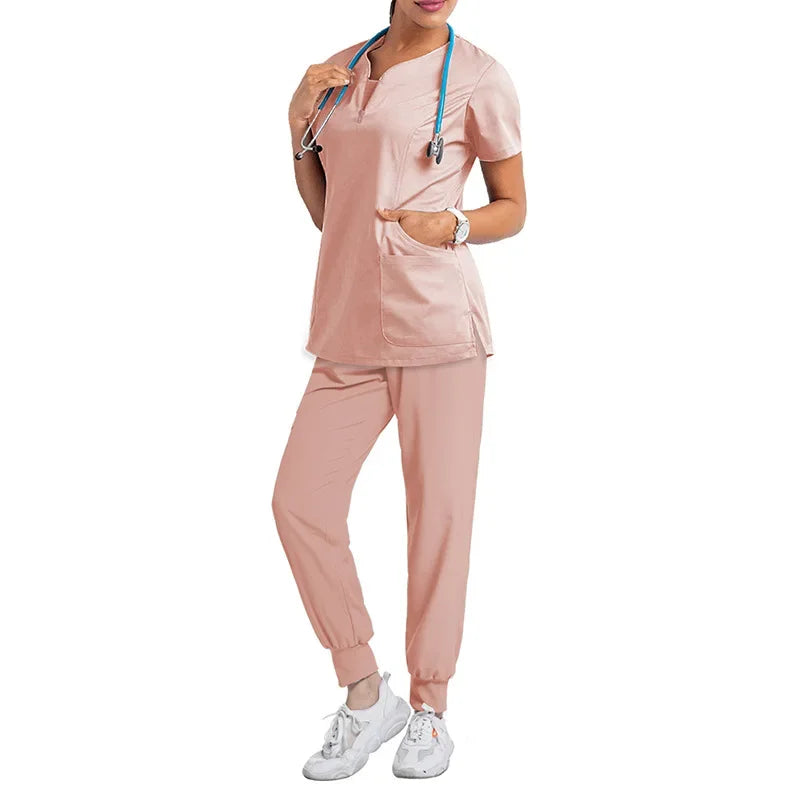 pink scrub set. jogger style scrub pant, tunic neckline scrub top