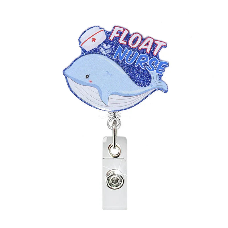 badge reel with whale, nurse's hat and "FLOAT NURSE'. Retractable, alligator clip.