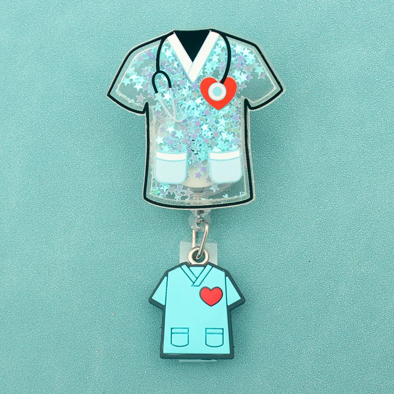 Badge reel - scrub top with stethoscope and another scrub top under the ID holder clasp.