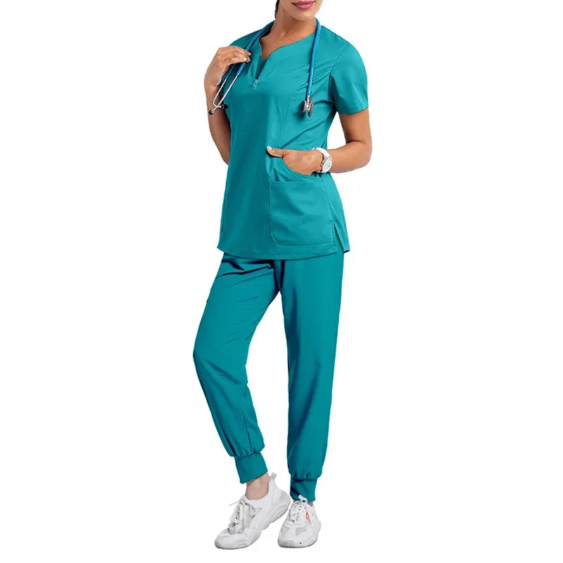 lake blue scrub set. jogger style scrub pant, tunic neckline scrub top