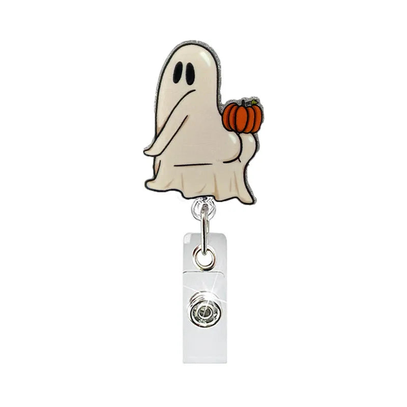 badge reel ghost with pumpkin. Retractable  with alligator clip.