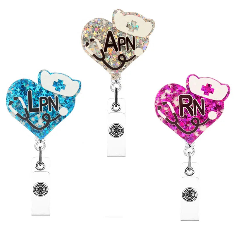 3 different badge reels, "LPN", "APN" and "RN". Retractable, alligator clip.