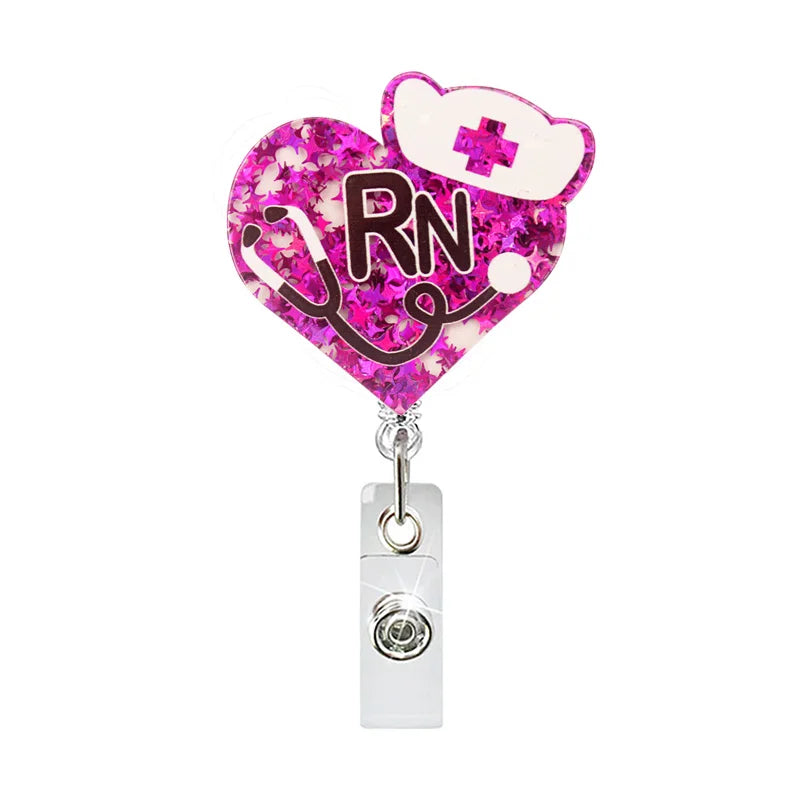 badge reel "RN" with heart, nurse's hat and a stethoscope. Retractable, alligator clip.