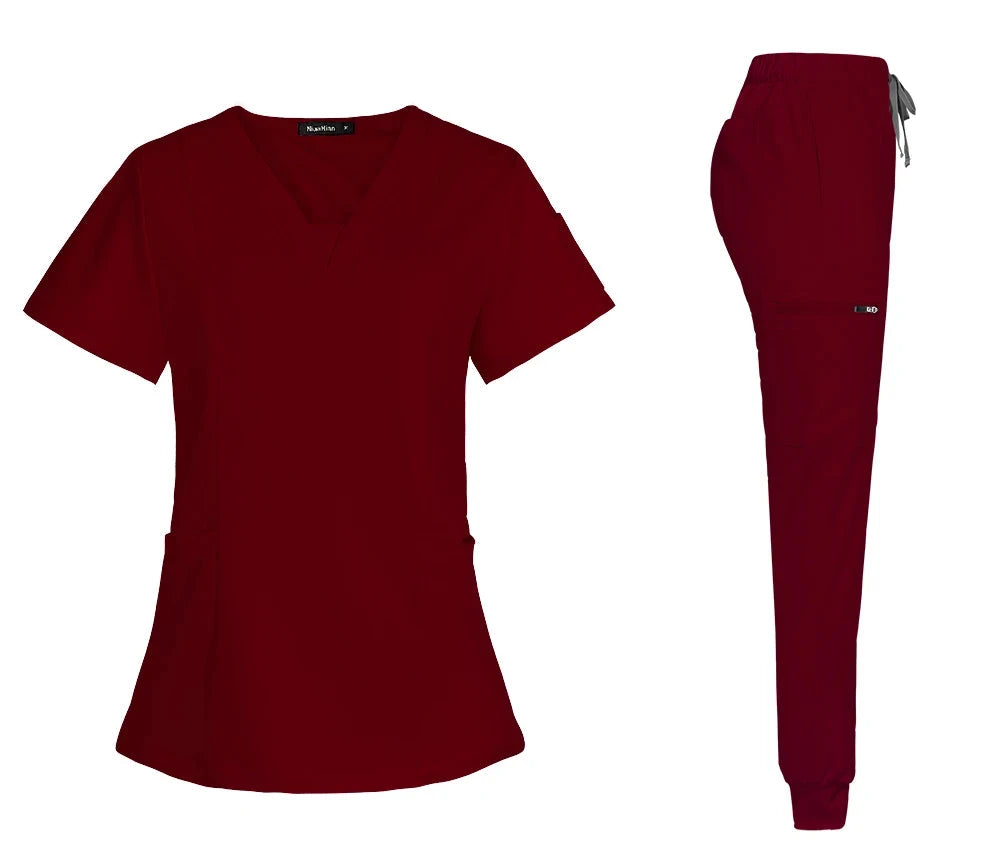 burgundy women scrub set with v-neck top with pockets, jogger-style pants with back, front and side pockets