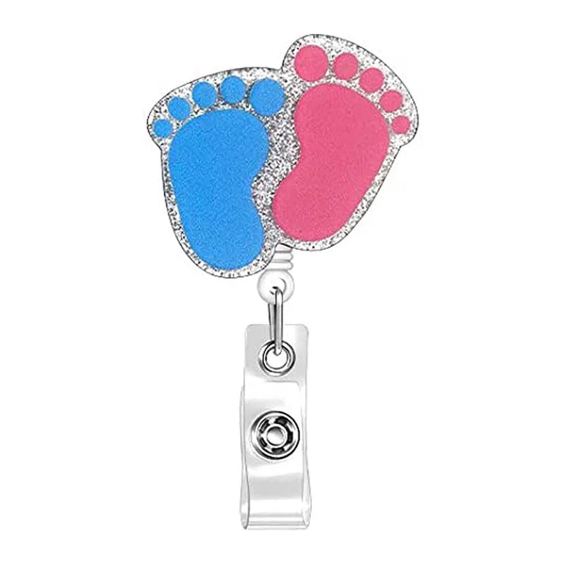 badge reel with baby feet. Retractable, alligator clip