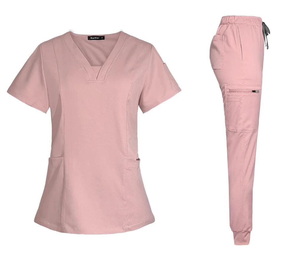 pink women scrub set with v-neck top with pockets, jogger-style pants with back, front and side pockets