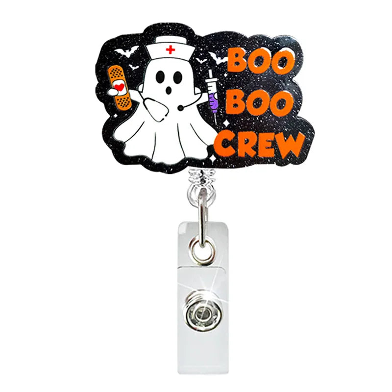 badge reel "boo boo crew". Retractable  with alligator clip.