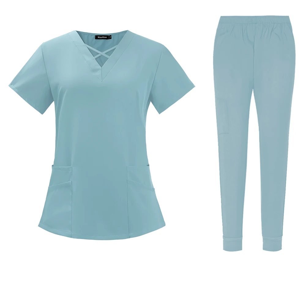 criss cross neck design scrub top with jogger style scrub pants scrub set light blue